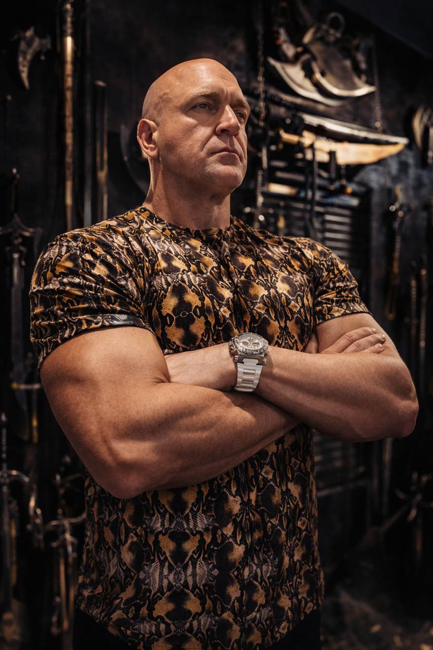 Brown and gold boa print spandex T‑shirt with a fitted silhouette for statement streetwear styling